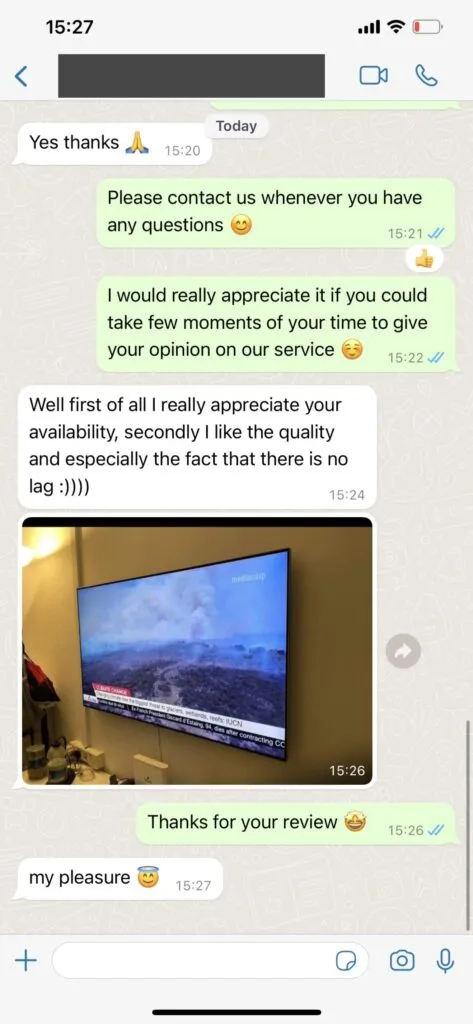 Customer feedback message on WhatsApp about satisfaction.